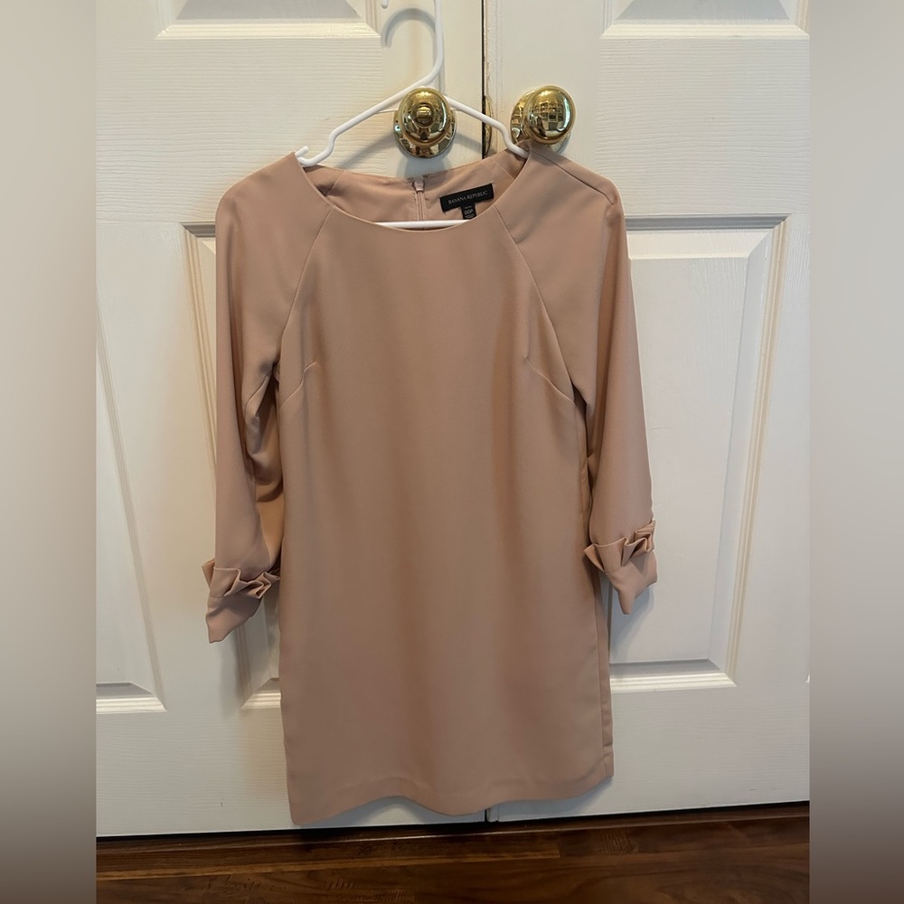 Long sleeved tan shift dress